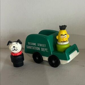 1970’s Sesame Street Green Sanitation Truck with Bert and Black and White Dog